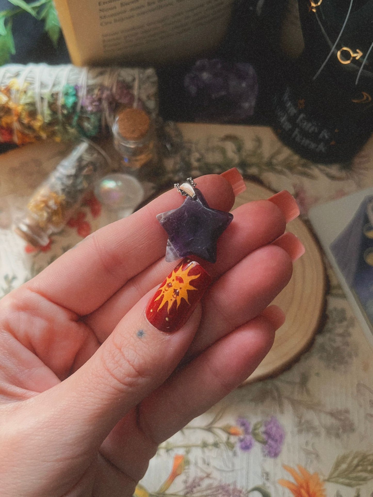 Colgante estrella amatista